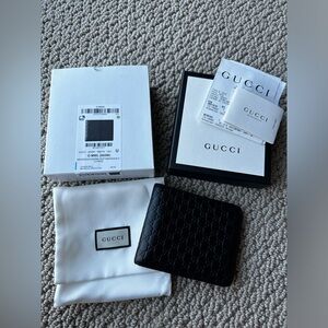 Gucci Microguccissima GG Black Leather Bifold Wallet